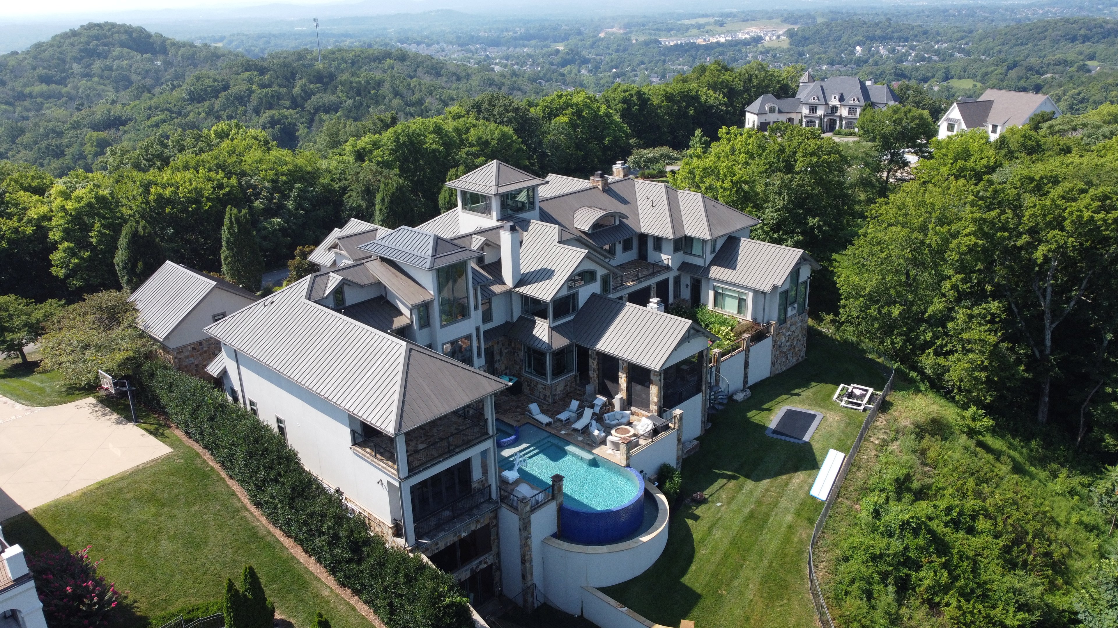 Back elevation of Mountain Contemporary, a modern luxury home built by Brentwood Builders