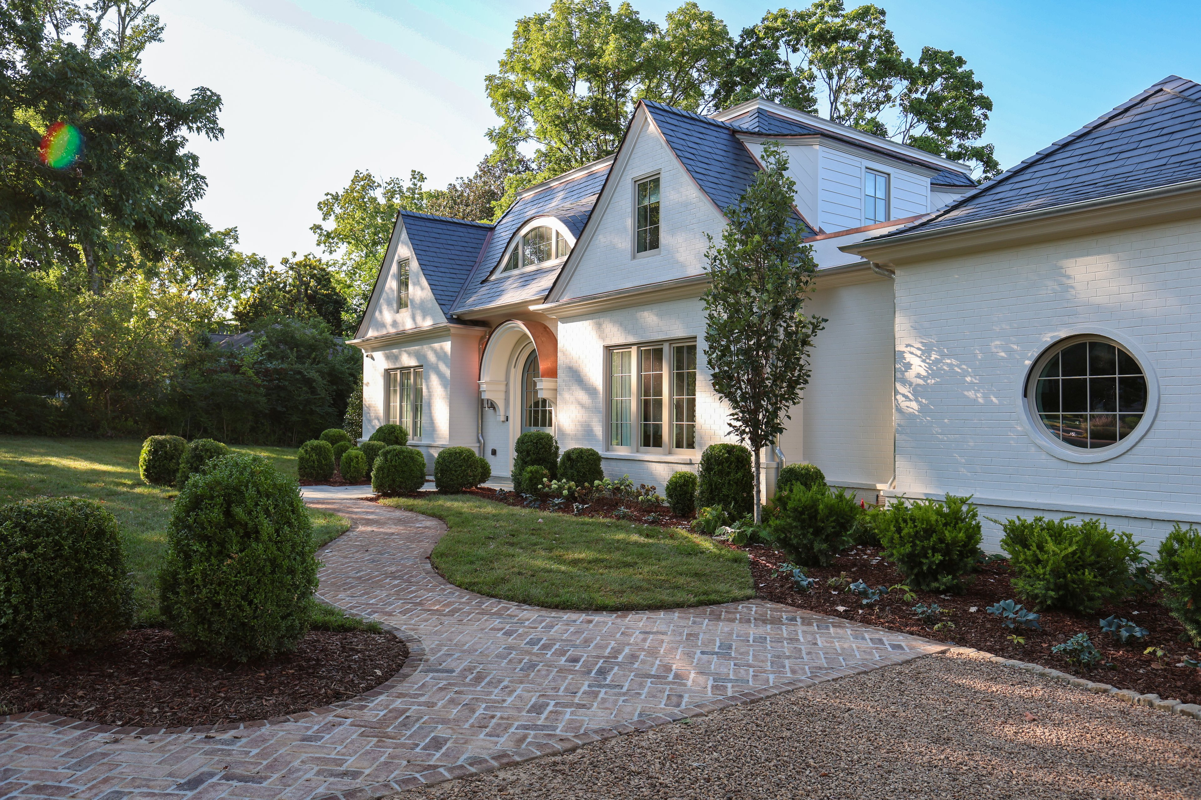 Front elevation of a cottage style custom home built by a builder in Belle Meade, TN