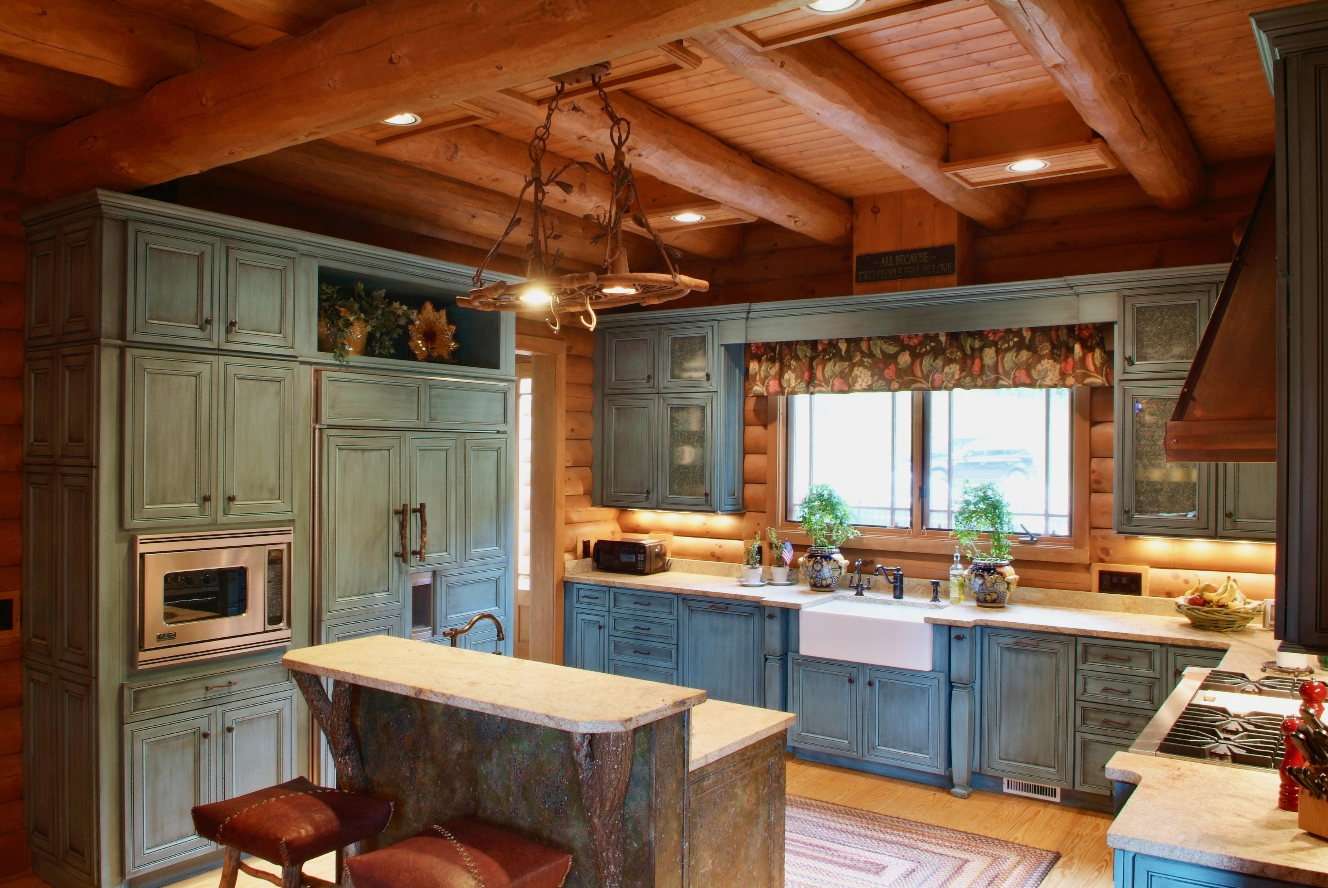 Kitchen of a log cabin lodge built by a custom home builder in Leipers Fork, Tennessee