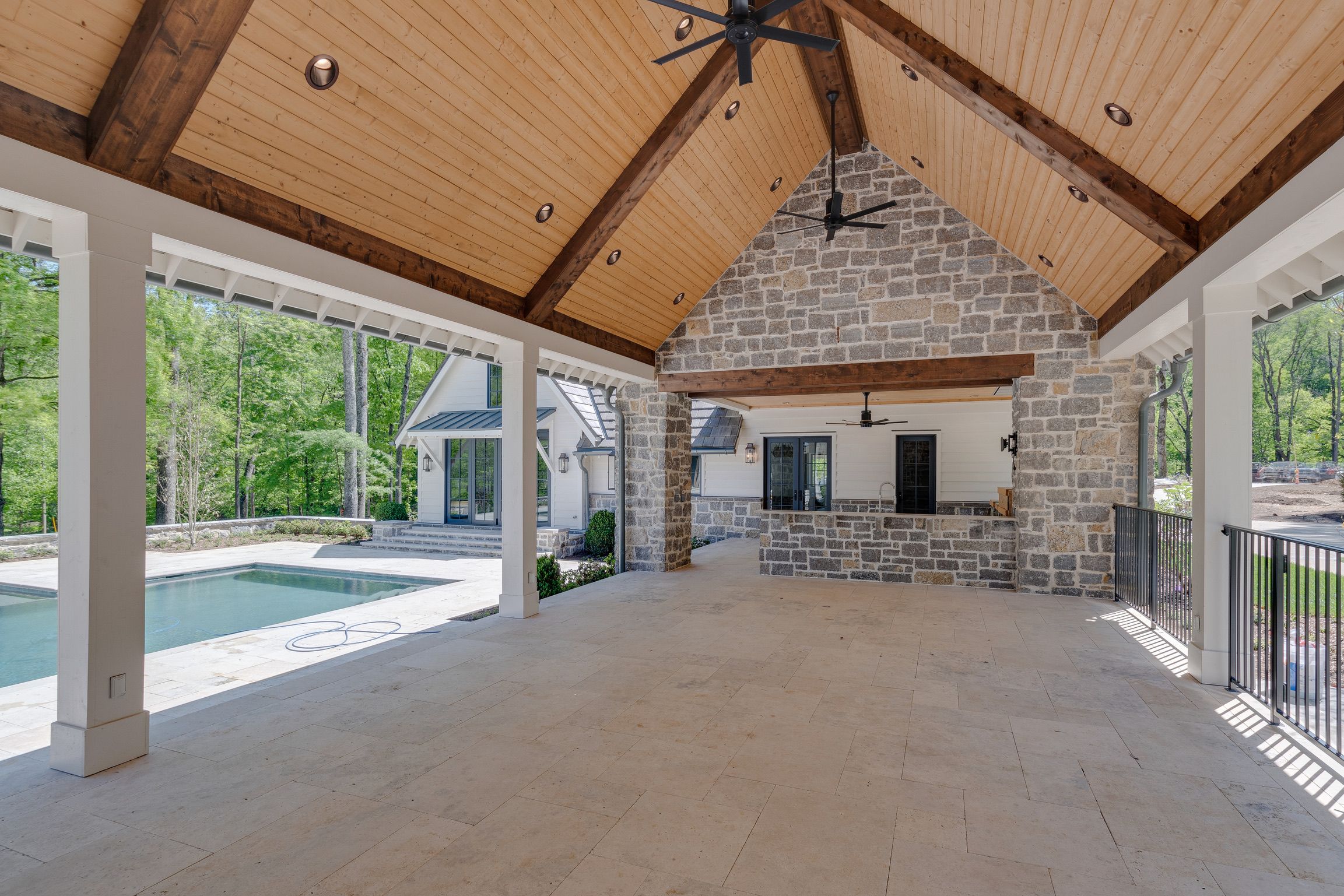 Back porch of a modern farmhouse built by a custom home builder in Brentwood, Tennessee