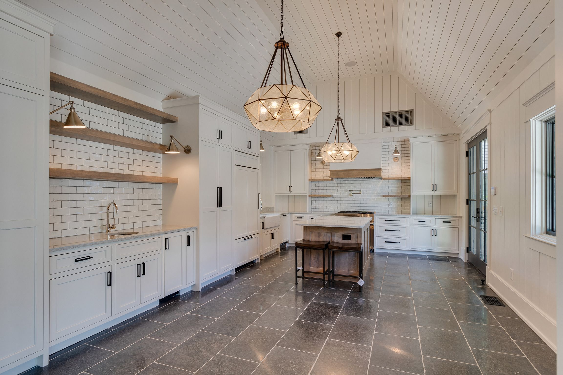 Kitchen view of a modern farmhouse built by a custom home builder in Brentwood, Tennessee