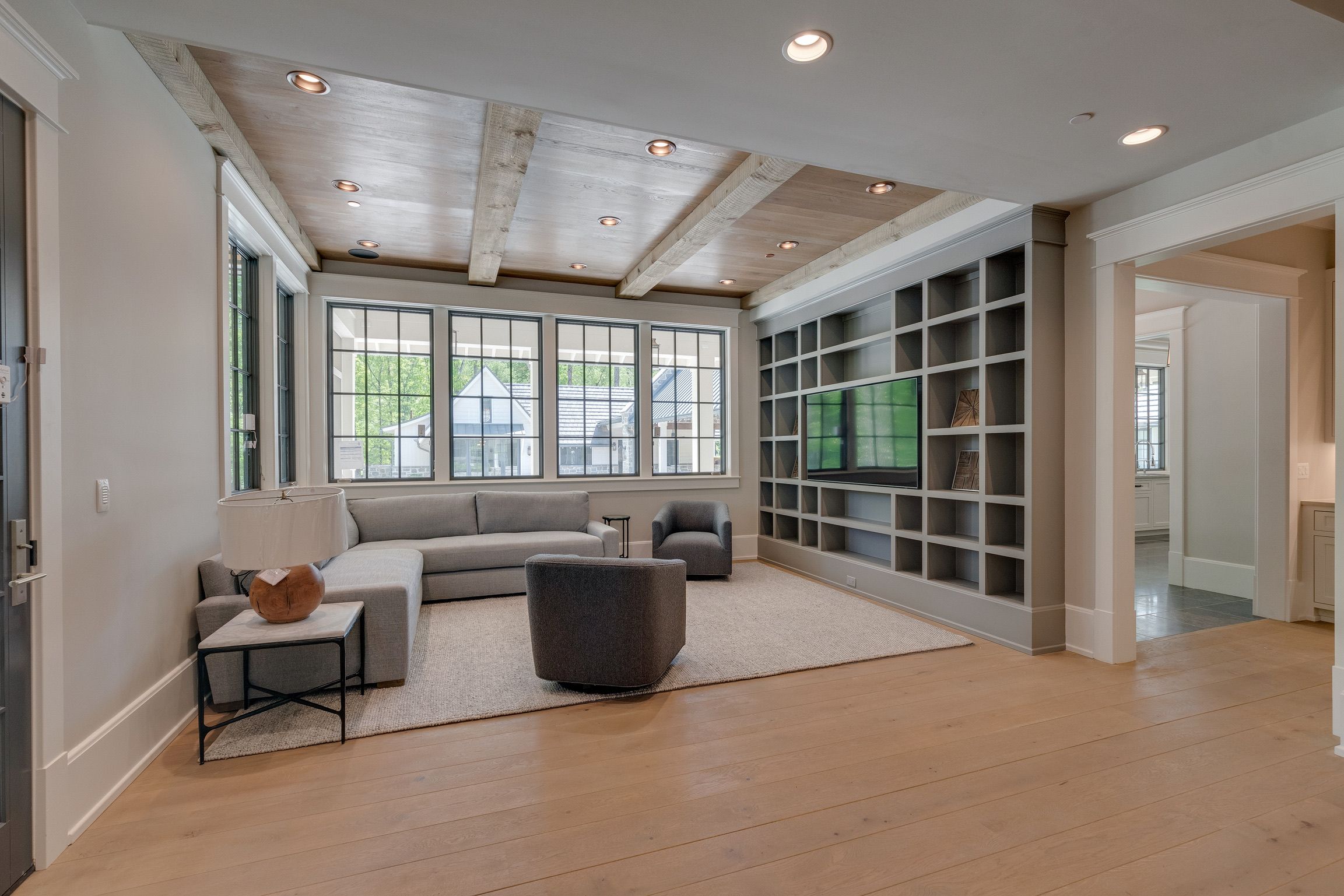 Living room of a modern farmhouse built by a custom home builder in Brentwood, Tennessee