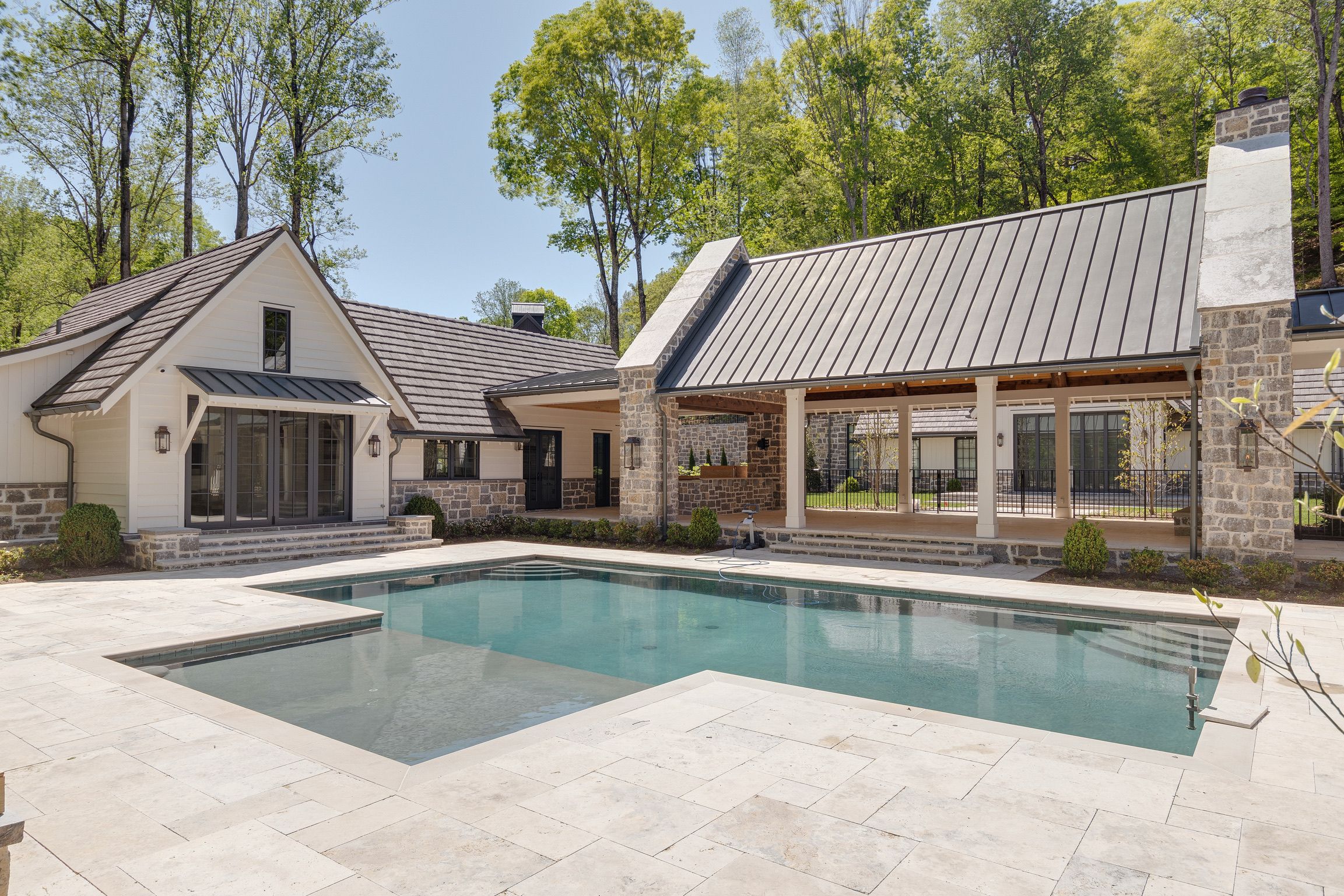 Pool in a modern farmhouse built by a custom home builder in Nolensville, Tennessee