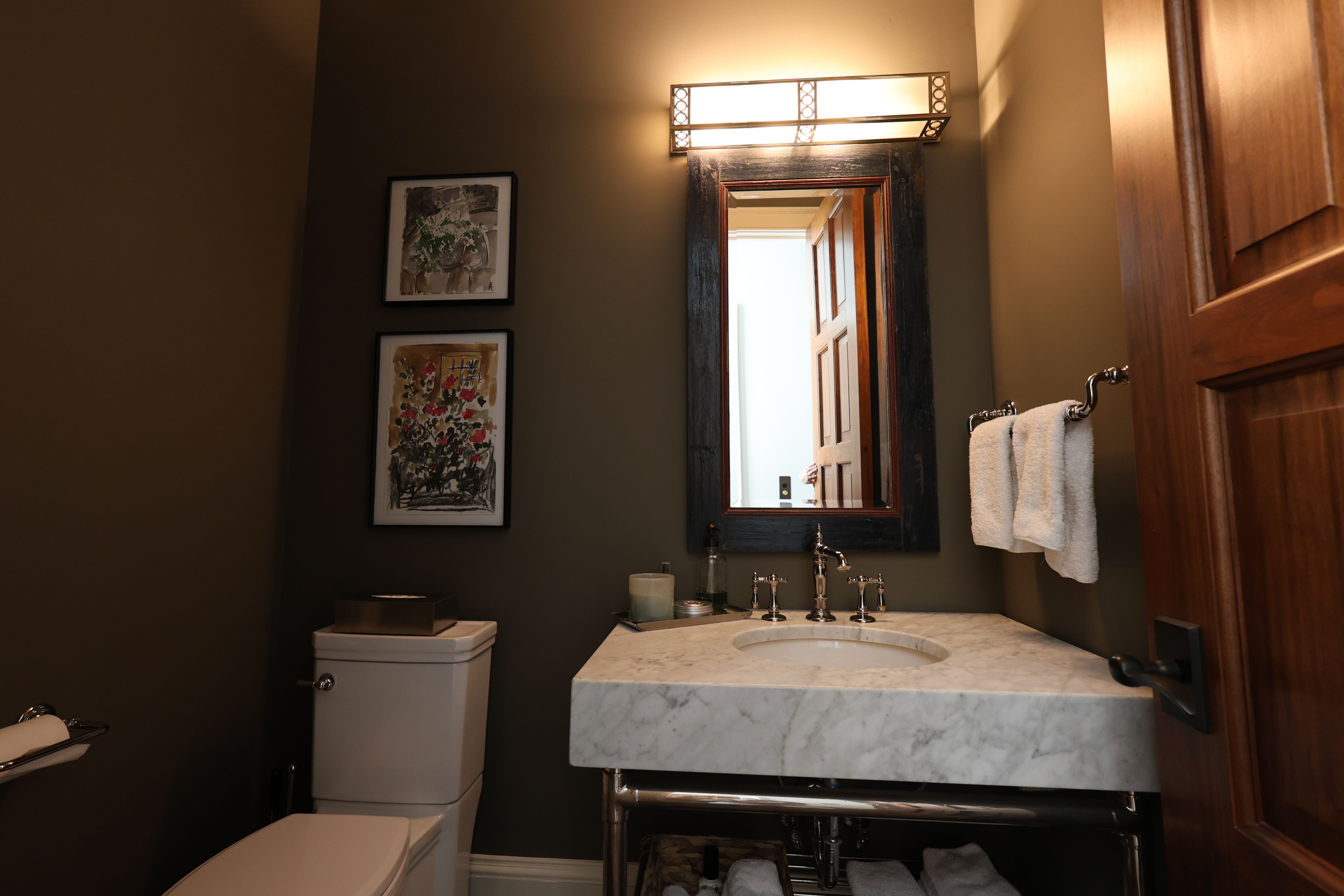 Powder bathroom of a luxury custom european style home built by a custom home builder in Franklin, Tennessee