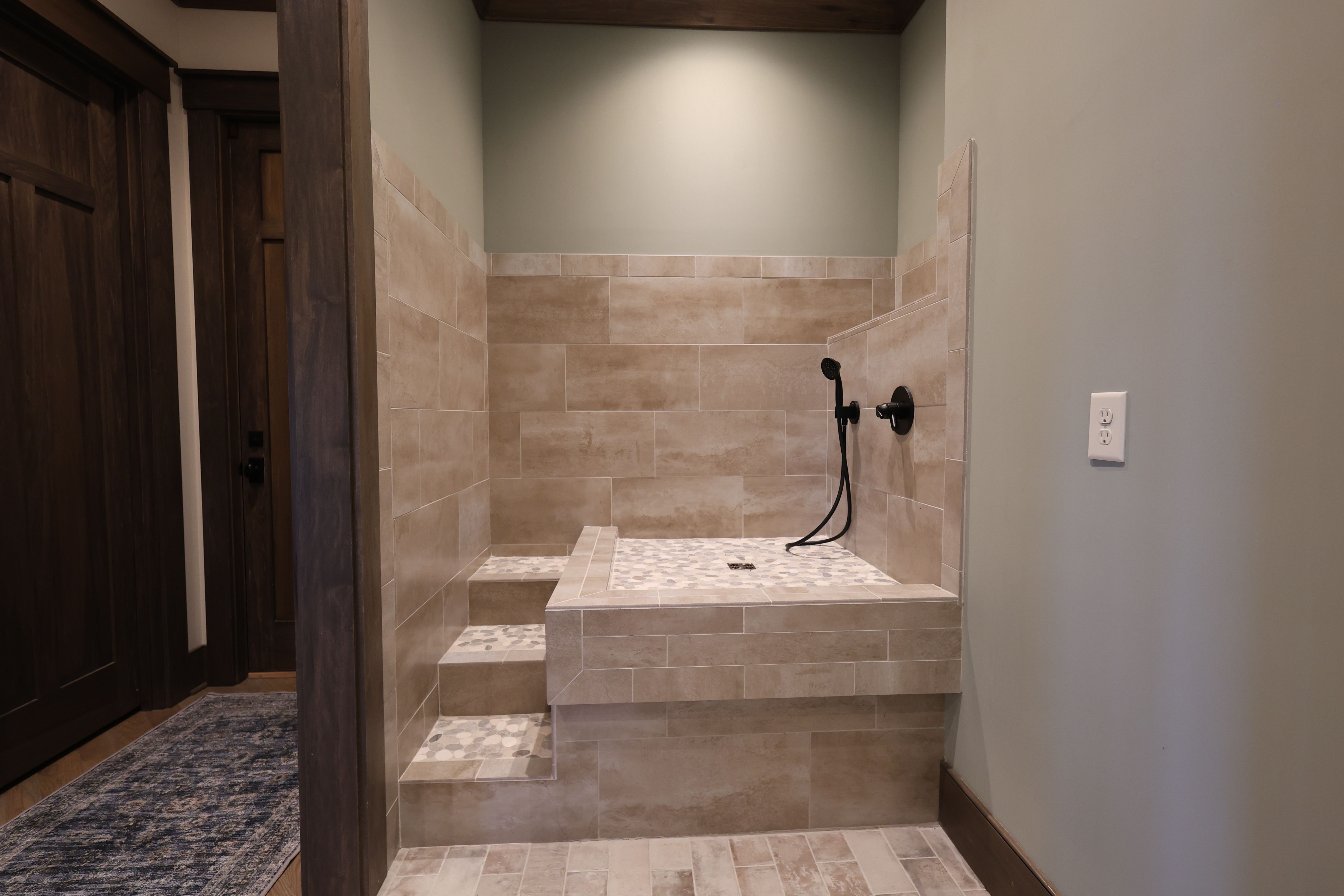 Dog shower of an updated rustic home built by a custom home builder in Nolensville, Tennessee